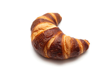 Classic French croissant isolated on a white background