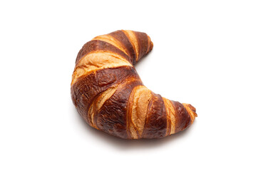 Classic French croissant isolated on a white background