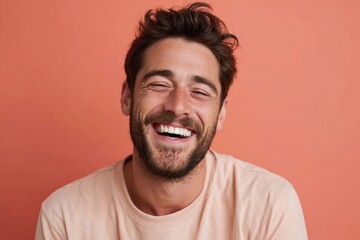 Fototapeta premium Smiling bearded man looking upwards