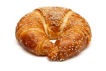 Round sesame seed croissant isolated on a white background