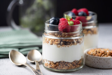 Healthy dessert for fitness and weightloss lifestyle: parfait with greek yogurt, granola, raspberries and blueberries