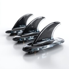 Three Surfboard Fins in a Row on White Background, Close-up Product Shot