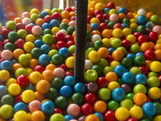 Vibrant Candy Dispenser Machine Filled with Colorful Gumballs