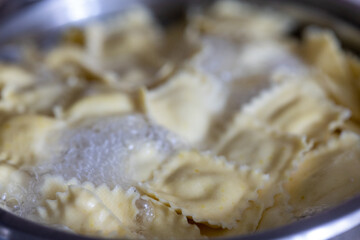 Italian Ravioli Pasta Cooking in a Metal Pot