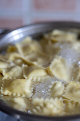 Italian Ravioli Pasta Cooking in a Metal Pot