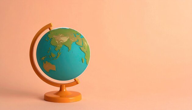Globe Still Life on Peach Backdrop for Education, Travel, or Global Concept