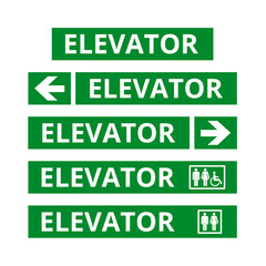 Green elevator signs with directional arrows on a white background