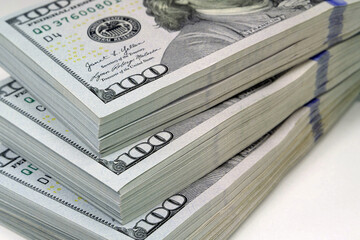 Thirty thousand of real american dollars. Three packs of one hundred dollars