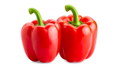 Two vibrant red bell peppers