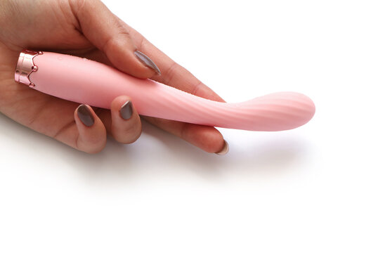 Rechargeable Clitoral and G-Spot Vibrator , Waterproof Couples Vibrator Pink, Wireless Remote Control Clitoris G Spot Stimulator, Adult Sex Toy for Women Solo Play or Couples Fun. in a woman's hand