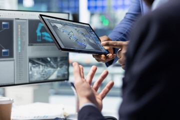 Engineering team reviewing insight for the production line in a solar factory, reinforcing the value of leadership and alternative energy efficiency in green technology settings. Solar tech.