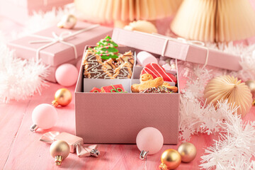 Colorful Christmas gingerbread cookies as present for Christmas Eve..