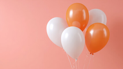 Colorful balloons in shades of orange and white against a soft pink background for festive occasions, space for text