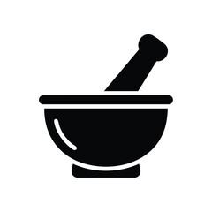 Mortar and pestle set used for grinding spices, herbs, or medicines in traditional culinary and medicinal practices