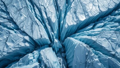 Dramatic aerial view of a fractured blue ice glacier surface