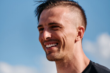 Fototapeta premium Post Run Tranquility Close-Up Portrait of a Man Finding Peace After Intense Training