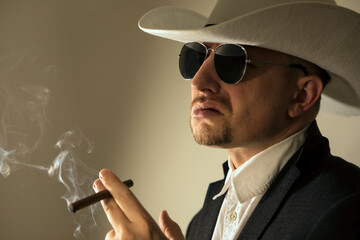 Retro style close-up photo of a shaded detective. People. Male. Photo. Shadow. 