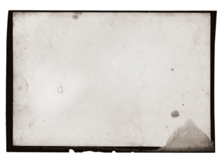 Vintage photo film frame template with dust scratches and splatters on transparent background (png image). Useful for design, vintage film effects, and backgrounds