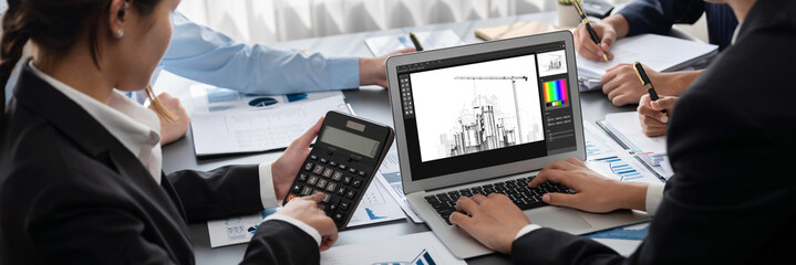 Business intelligence and data analysis concept. Analyst team working on financial data analysis...