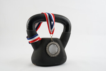 medal and kettlebell