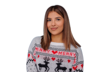 Young woman smiling, wearing a festive christmas sweater, holiday season apparel, transparent background