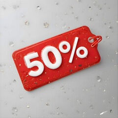 Red tag with 50 percent written on it placed on a plain background symbolizing retail sale promotion commercial marketing discount and seasonal product advertising