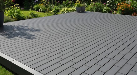 Gray Patio Deck with Rectangular Pavers.
