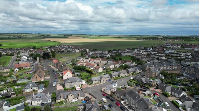 Stunning Aerial Drone Footage of the Aberdour Coastline in Scotland, Scenic Seaside Landscape with Rocky Cliffs, Blue Ocean Waves and Picturesque Coastal Views, Travel and Nature Background Video