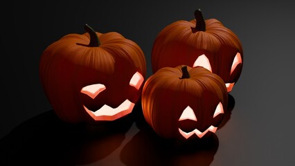 Group of carved Halloween pumpkins glowing on dark reflective surface