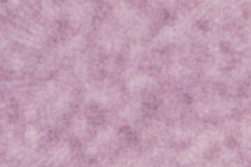 A soft, blurry, abstract background with a gentle pinkish-purple hue and subtle darker speckles.