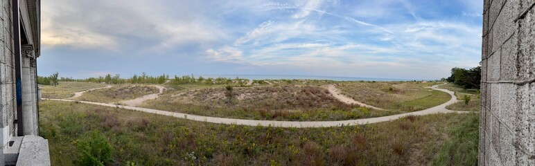 panoramic landscape with fence and grass