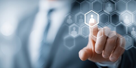 Businessman's finger touches a digital network of interconnected people icons