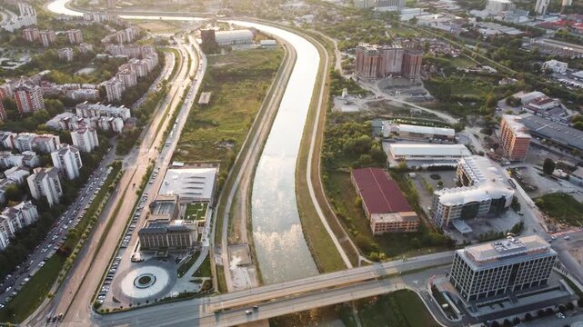 Aerial View of Skopje: Vardar River Flowing Through the Urban Landscape at Sunset