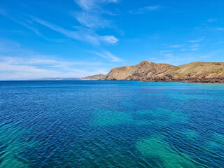 Turquoise Ocean and Rocky Coastline in Queensland Australia