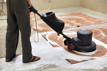 Carpet chemical cleaning with professionally disk machine. Early spring cleaning or regular clean...