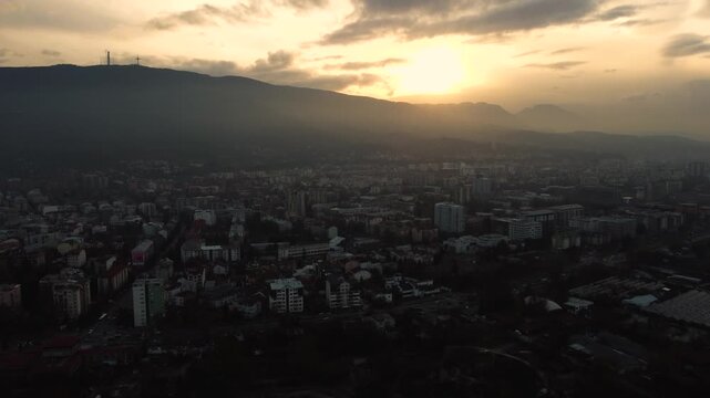 Skopje Cityscape at Sunset: Aerial View with Millennium Cross on Vodno Mountain
