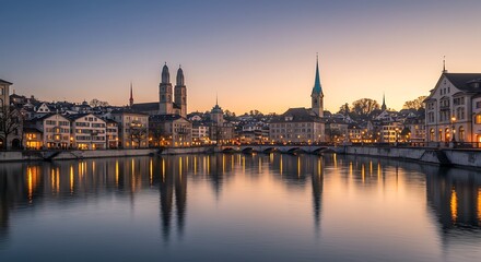 Naklejka premium Cityscape at dusk buildings reflected in calm water under a clear sky
