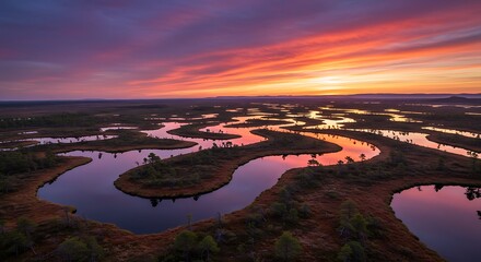 Scenic river landscape at sunset with colorful sky and reflections
