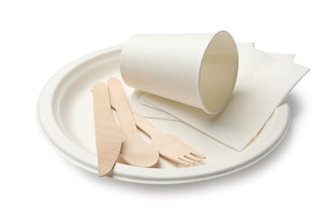 Set of disposable tableware and napkins isolated on white