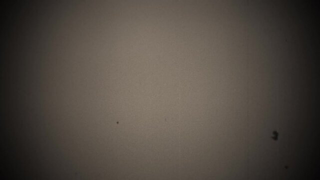 Retro style 8mm film texture with grain and scratches