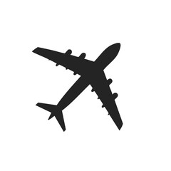 Black silhouette of a large four engine passenger airplane flying overhead