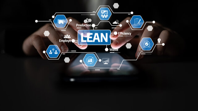 A close-up view of hands using a device to explore digital concepts related to lean principles, showcasing various aspects of production, efficiency, and employee involvement. Tessel