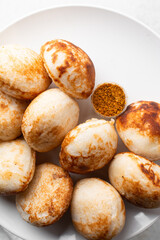 Overhead view of a plate of masa, top view of food from northern nigeria masa rice cake, nigerian ethnic foods