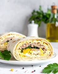 Two halves of a filled tortilla wrap