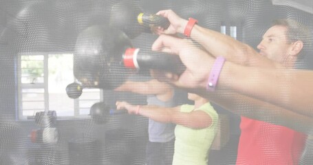 Three fitness partners gripping kettlebells and swinging upward for power boost with fourth joining - Powered by Adobe