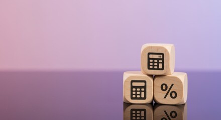 Wooden cubes with calculator and percentage symbols showing financial growth