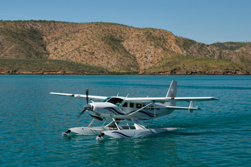 Taxiing seaplane just after landing on water - Talbot Bay, WA, Australia