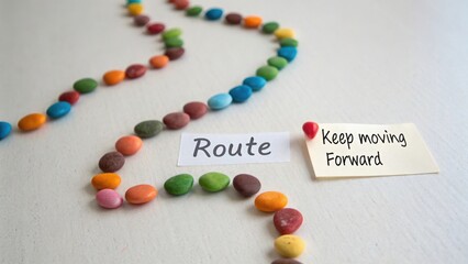 Colorful Pebble Path Marking Route and Positive Forward Message