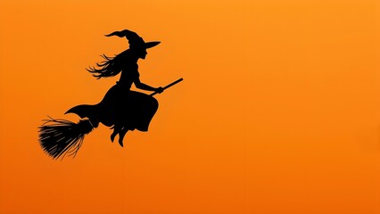 Elegant Witch Silhouette Against an Orange-to-Black Gradient Sky