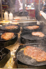 cooking steak spaghetti at vertical composition